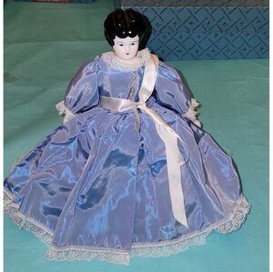 Vintage Blue Porcelain Doll with White Accents